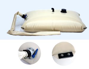 Beige pillow water tank with metal pads in the corners, featuring a collapsible design, a blue valve, and connection points. Two close-up insets showcase the valve and a bolted attachment on the bladder.